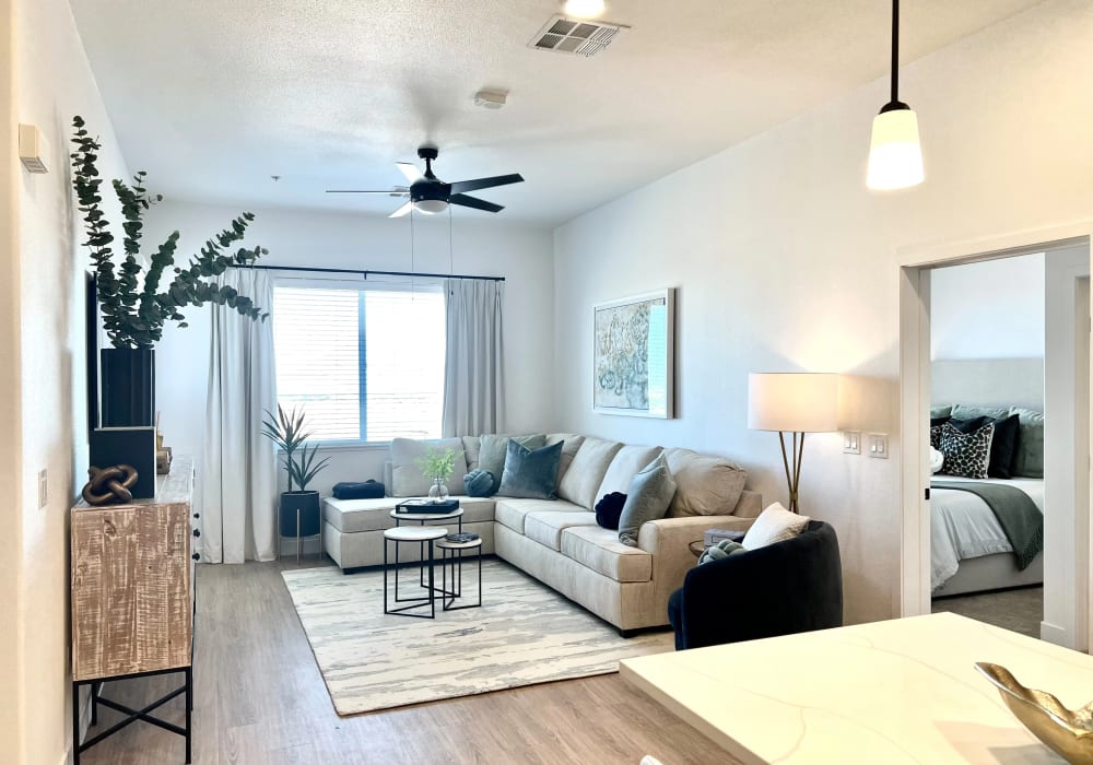Beautiful living room with wood-style flooring at Zinc 1501 in Sacramento, California