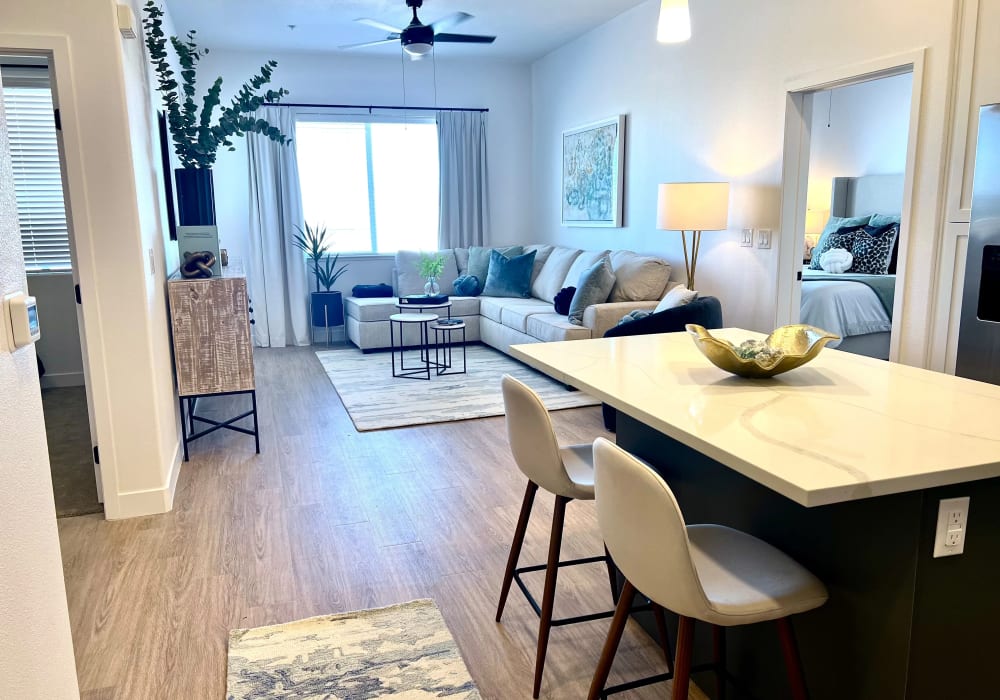 Kitchen island and spacious living room at Zinc 1501 in Sacramento, California