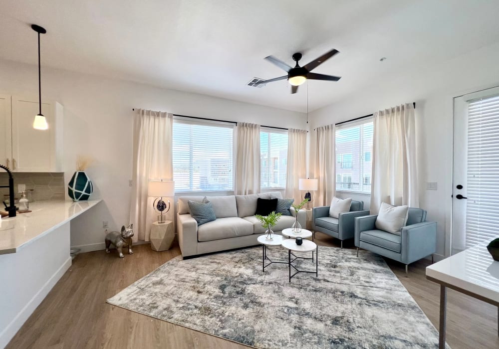 Living room with wood-style flooring at Zinc 1501 in Sacramento, California