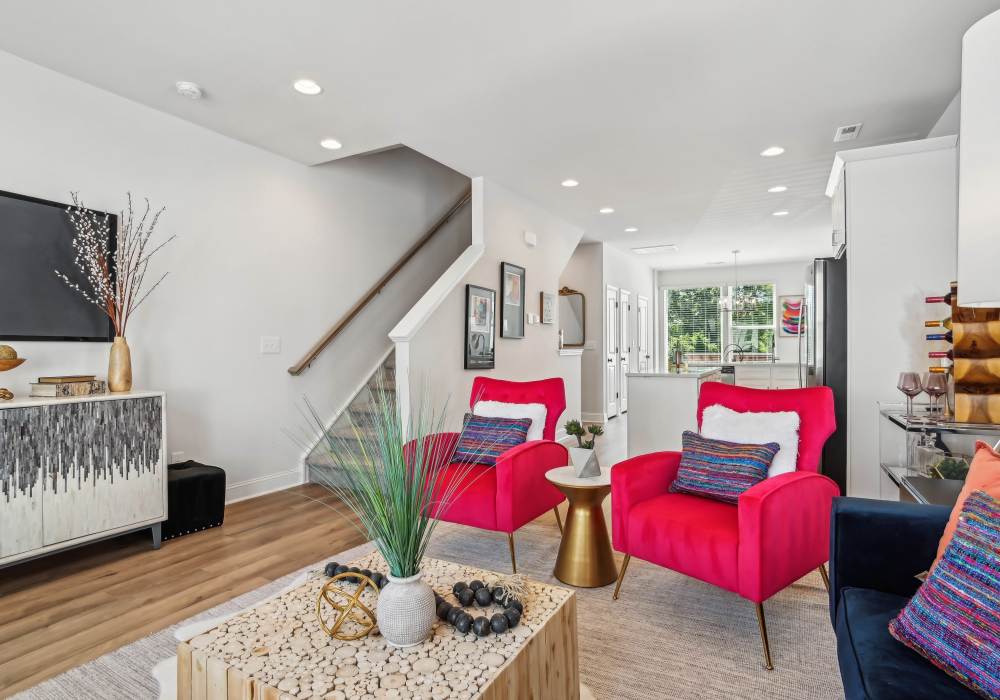 Living room with hard wood flooring  at Crossings At NoDa in Charlotte, North Carolina