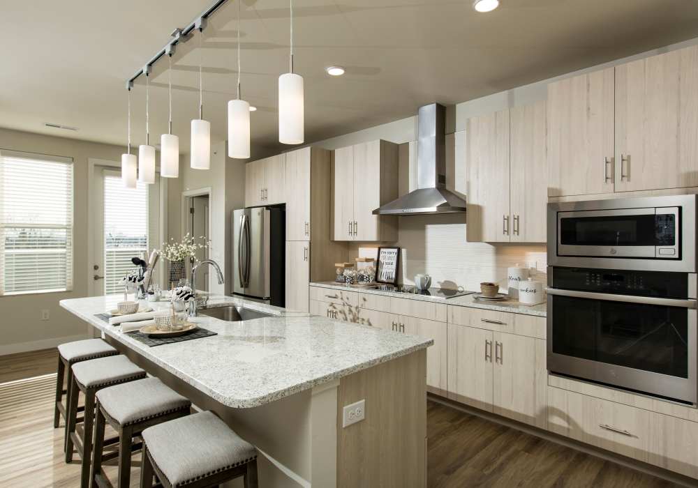 Kitchen with breakfast counter at Altair At The Heights in Richmond Heights, Missouri 