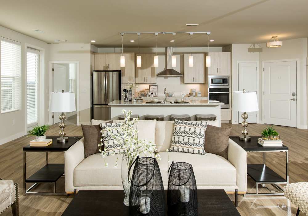 Spacious living and dining area with natural lighting from windows at Altair At The Heights in Richmond Heights, Missouri