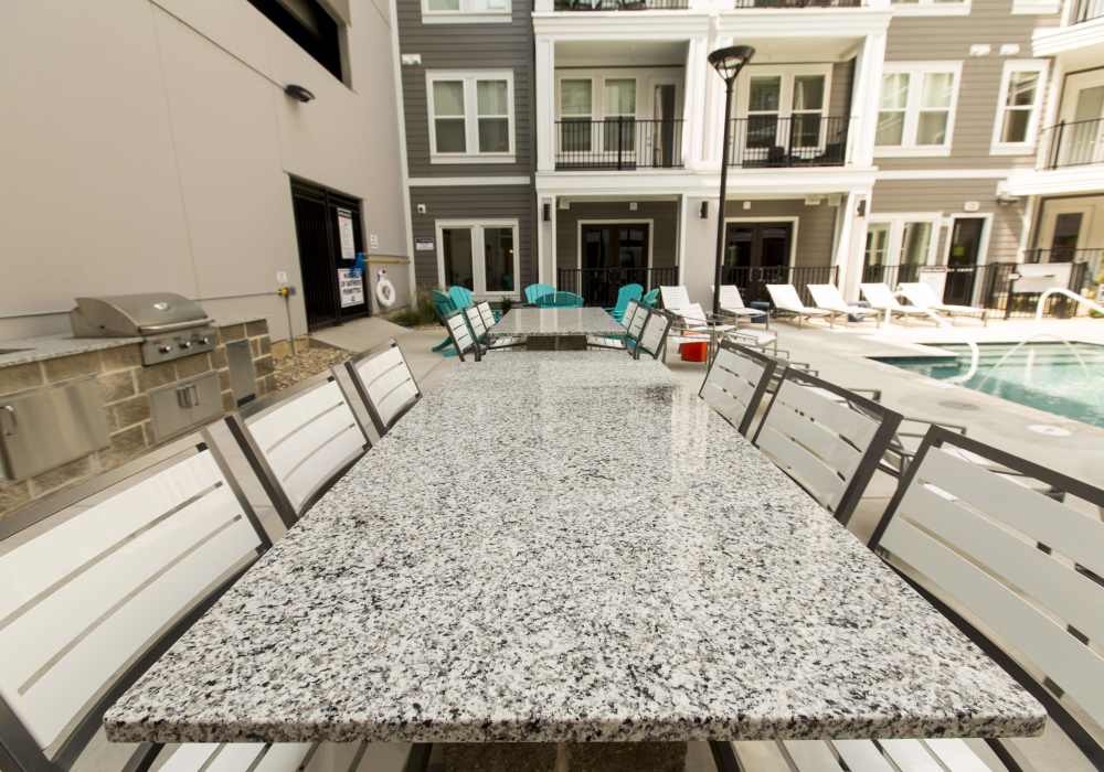 Outside corridor with seating at Altair At The Heights in Richmond Heights, Missouri