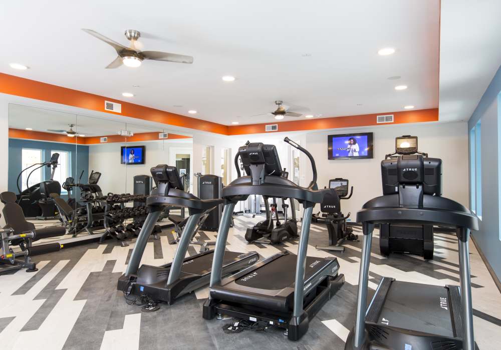 Fitness center with tread mills at Altair At The Heights in Richmond Heights, Missouri