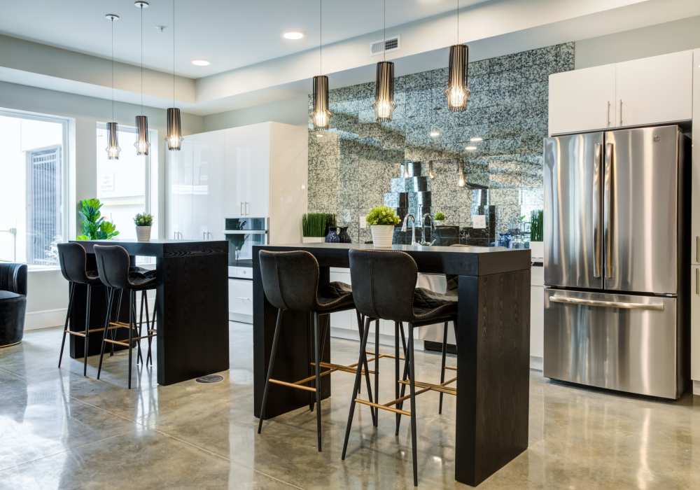 Clubhouse with beautiful hanging lights at Altair At The Heights in Richmond Heights, Missouri