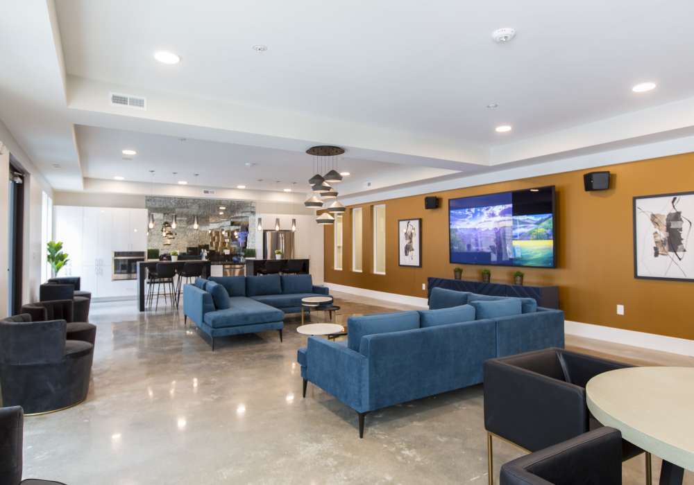 Clubhouse with big television at Altair At The Heights in Richmond Heights, Missouri