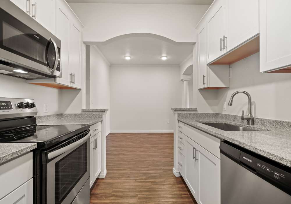 Apartment kitchen with sink at Irving Schoolhouse Apartments in Salt Lake City, Utah