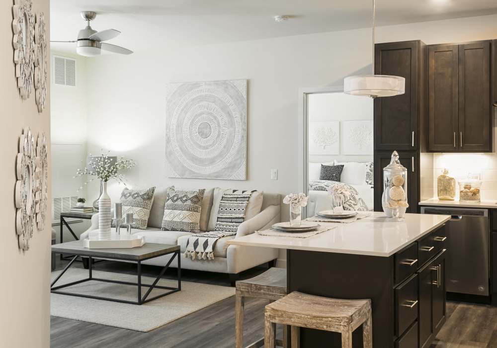 Spacious living and kitchen area at Altair At The Preserve in O'Fallon, Missouri
