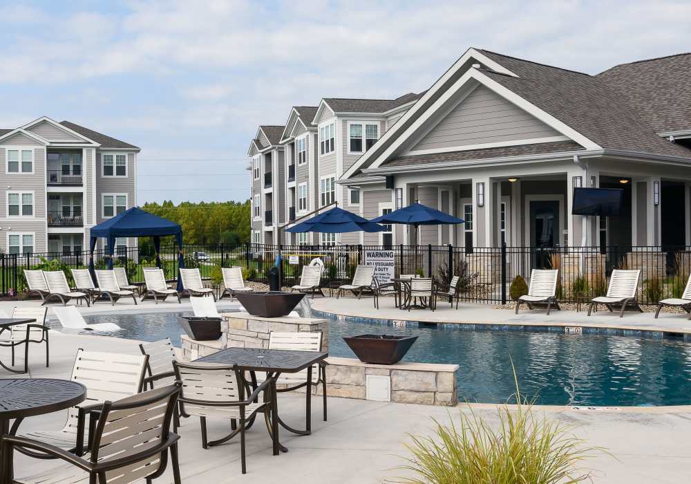 Sitting area near pool side at Altair At The Preserve in O'Fallon, Missouri