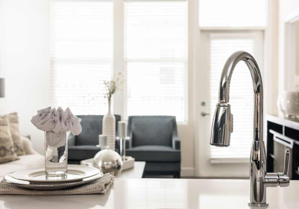 Kitchen with view of living at Altair At The Preserve in O'Fallon, Missouri