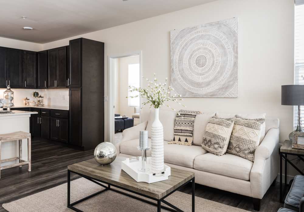 Living room with coffee table at Altair At The Preserve in O'Fallon, Missouri