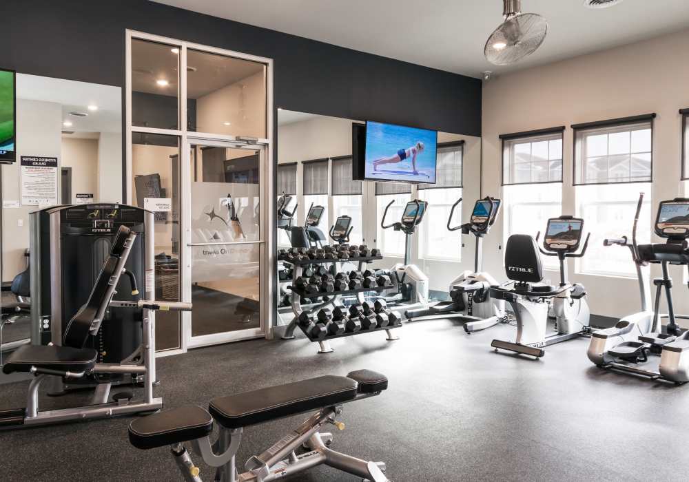 Gym fitness center at Altair At The Preserve in O'Fallon, Missouri