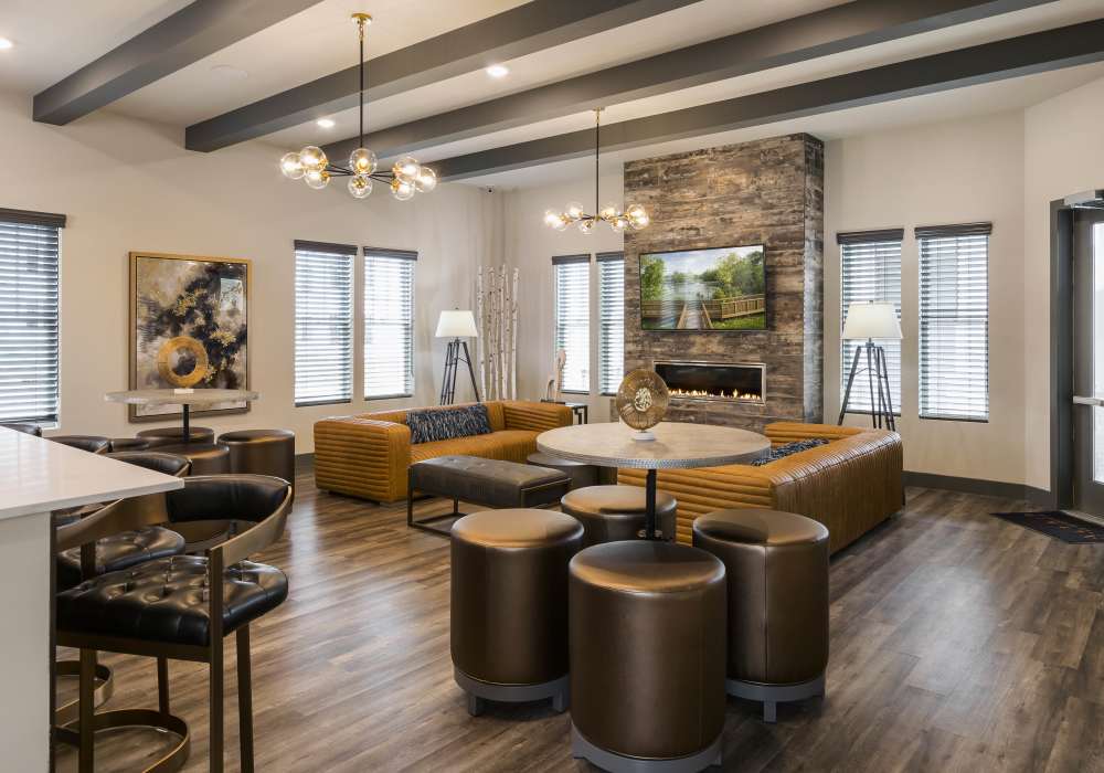 Clubhouse room with beautiful couch at Altair At The Preserve in O'Fallon, Missouri