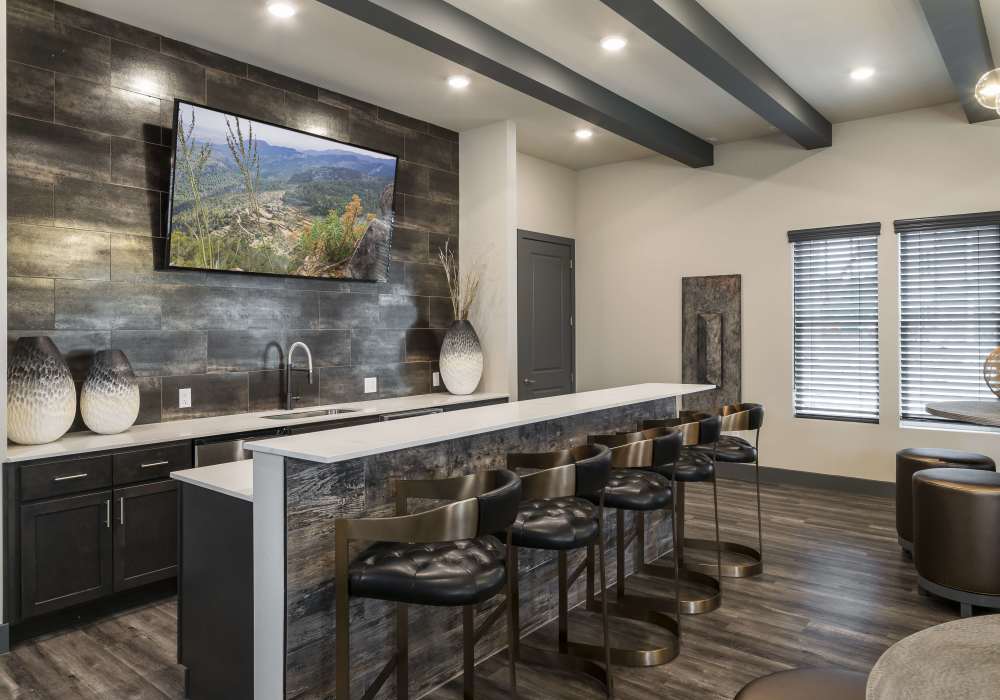 Kitchen with barstools at Altair At The Preserve in O'Fallon, Missouri