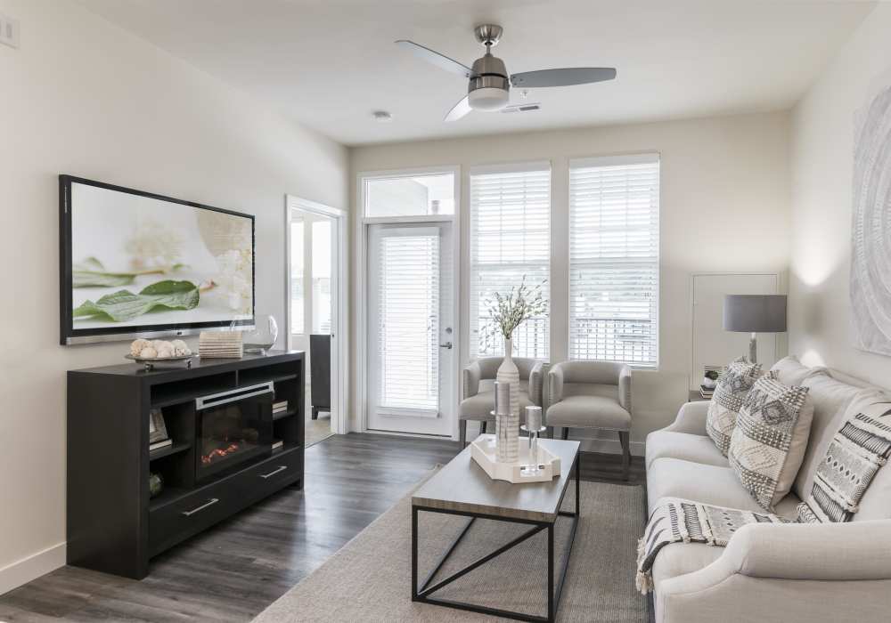 Well-lit and air con living room at Altair At The Preserve in O'Fallon, Missouri