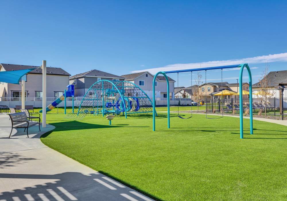 Community playground with swings at BB Living at The Oaks in Meridian, Idaho