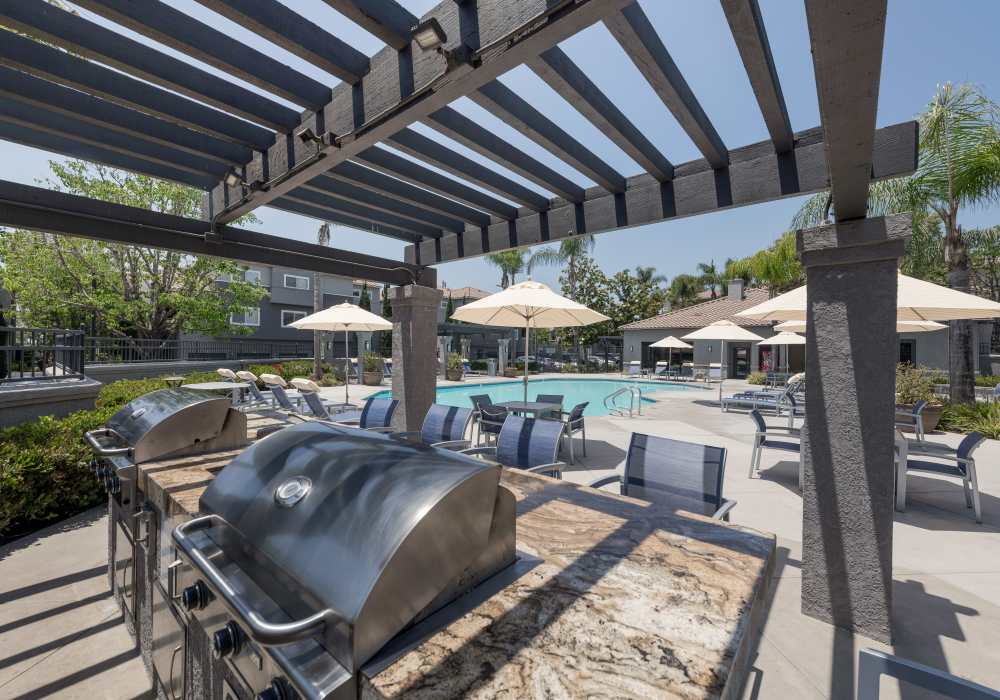 Pool deck at Madrid Apartments in Mission Viejo, California