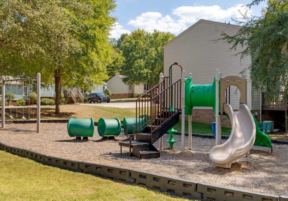 Community park with slides at Edge at Concord in Concord, North Carolina, 
