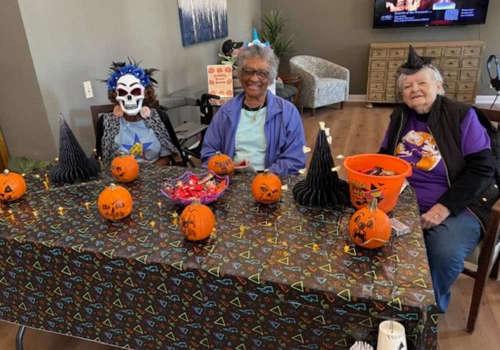 Residents in costume with candies for Halloween at Truewood by Merrill, Fig Garden in Fresno, California