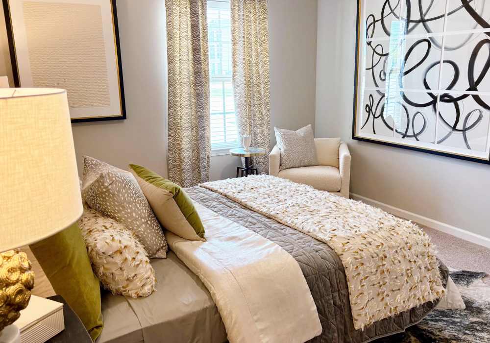 Bedroom with Bedside Lamp at Edenbrook Ridge in Pflugerville, Texas