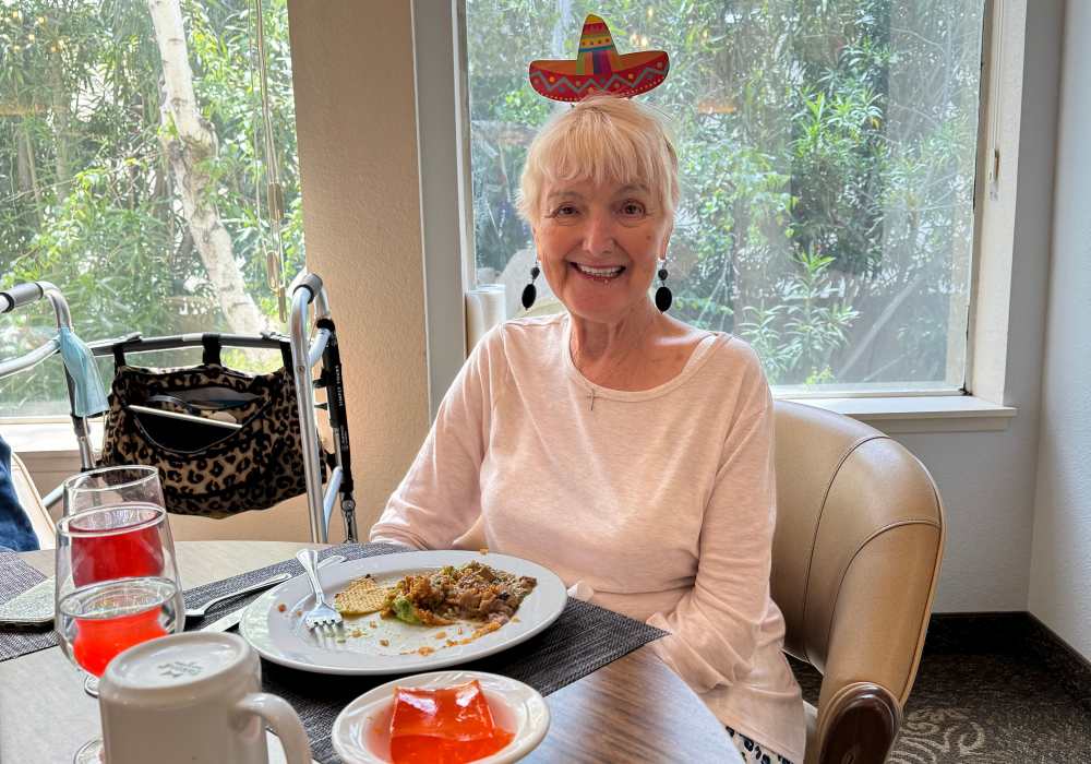 Resident wearing a hat for Cinco de Mayo celebration at Truewood by Merrill, Fig Garden in Fresno, California
