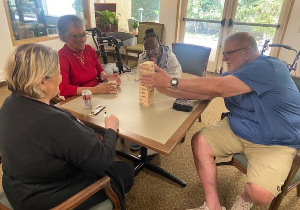 Residents playing Jenga at Truewood by Merrill, Fig Garden in Fresno, California