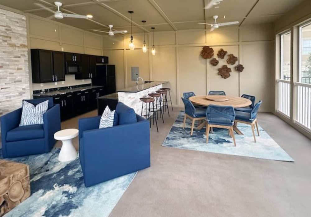 Seating and summer kitchen with an outdoor view at Edenbrook Ridge in Pflugerville, Texas