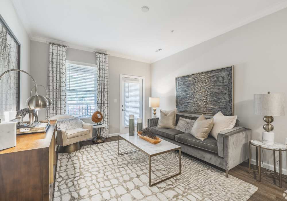 Brightly lit spacious living room at Harborstone in Ladson, South Carolina