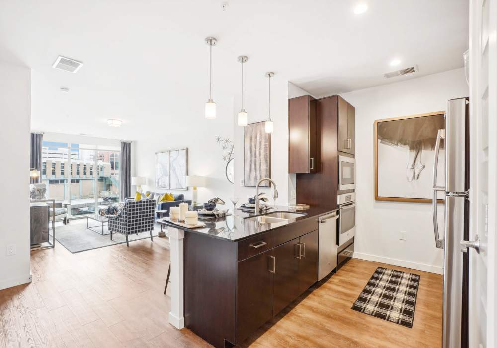 Eat in kitchen dining area and open living room at Carroll at Bellemeade in Greensboro, North Carolina