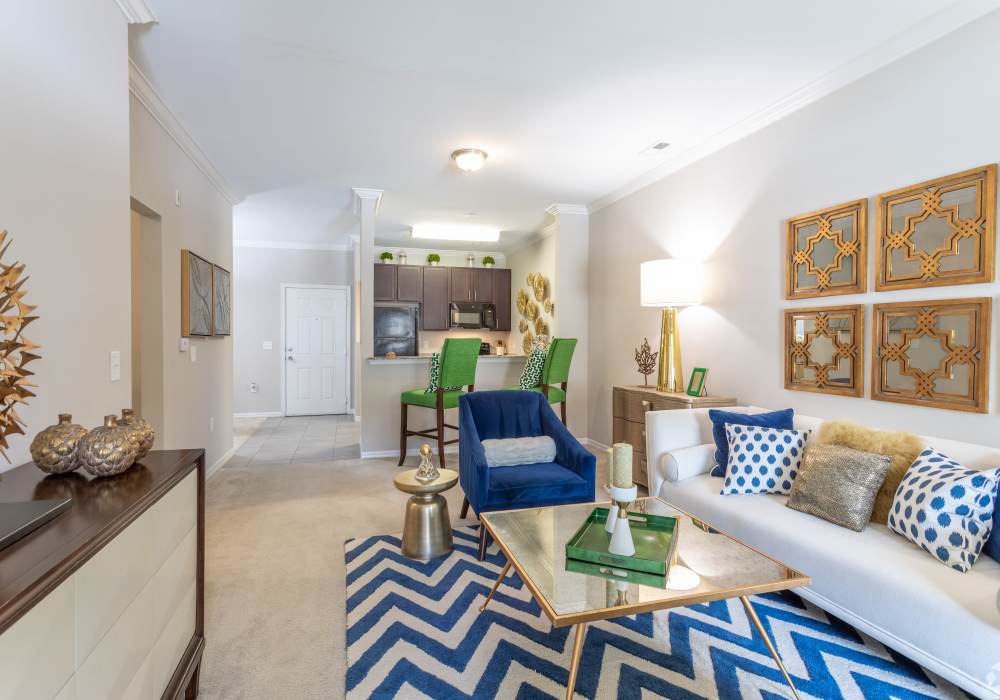 Spacious and bright living room at Village at Town Center in Raleigh, North Carolina