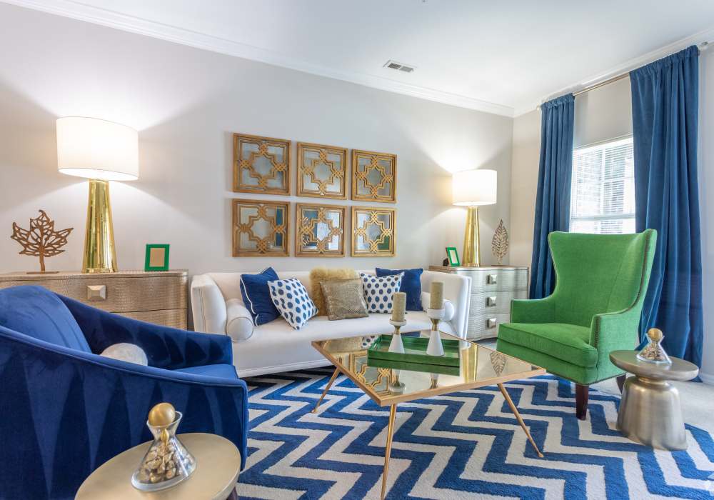 Spacious well lit living room at Village at Town Center in Raleigh, North Carolina