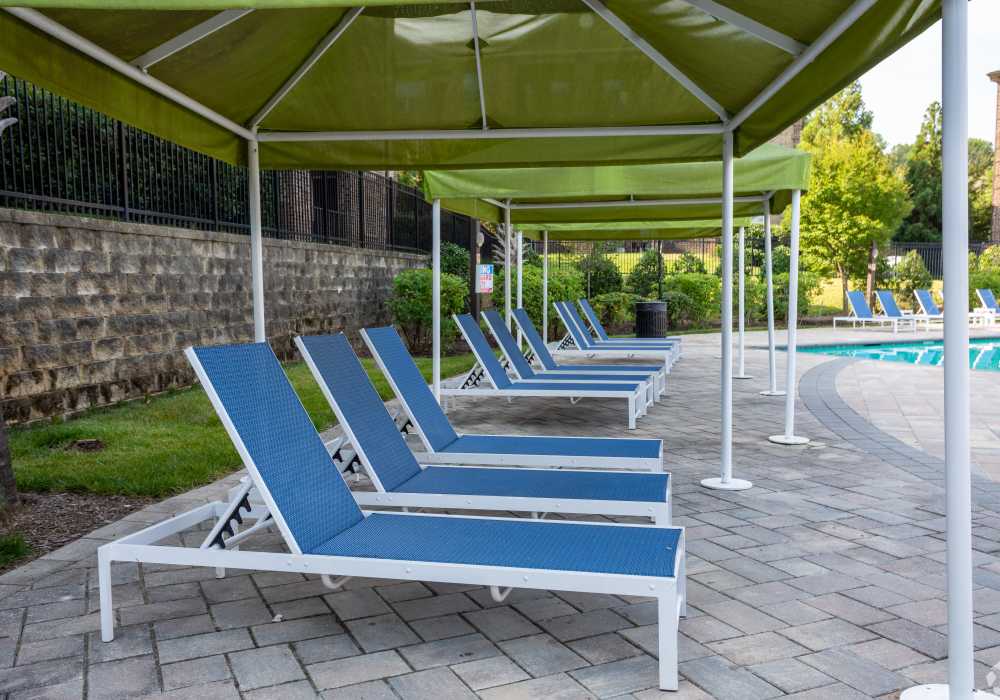 poolside lounge chairs under cabana at Village at Town Center in Raleigh, North Carolina