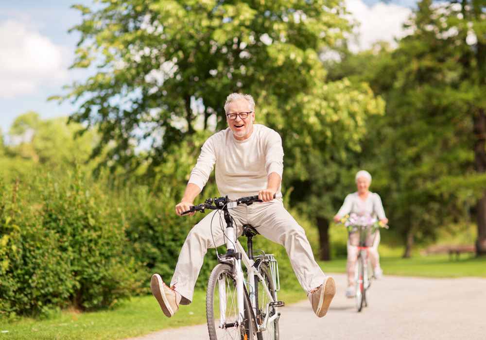 residents riding bikes at Savannah House At Lawton in Lawton, Oklahoma