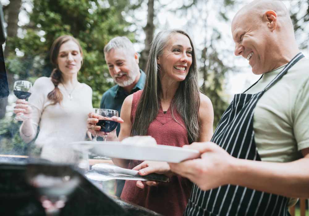 residents cooking outside at Savannah House At Lawton in Lawton, Oklahoma