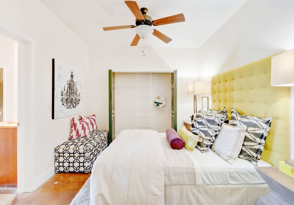 Bedroom with closet and painted concrete flooring CityView Apartments in Greensboro, North Carolina .