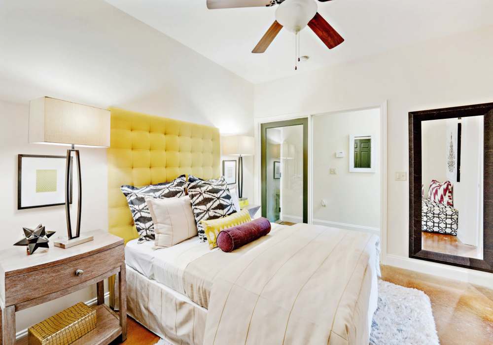 Bedroom with closet and painted concrete flooring CityView Apartments in Greensboro, North Carolina .