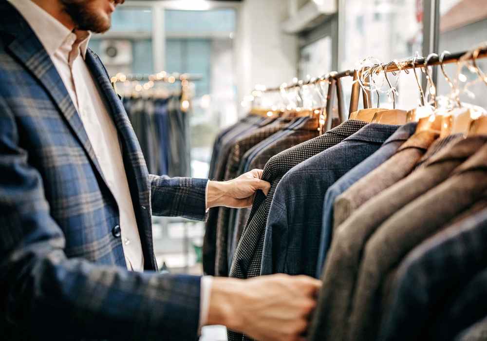 Man shopping suits at a store near Villa Montanaro in Pleasant Hill,California