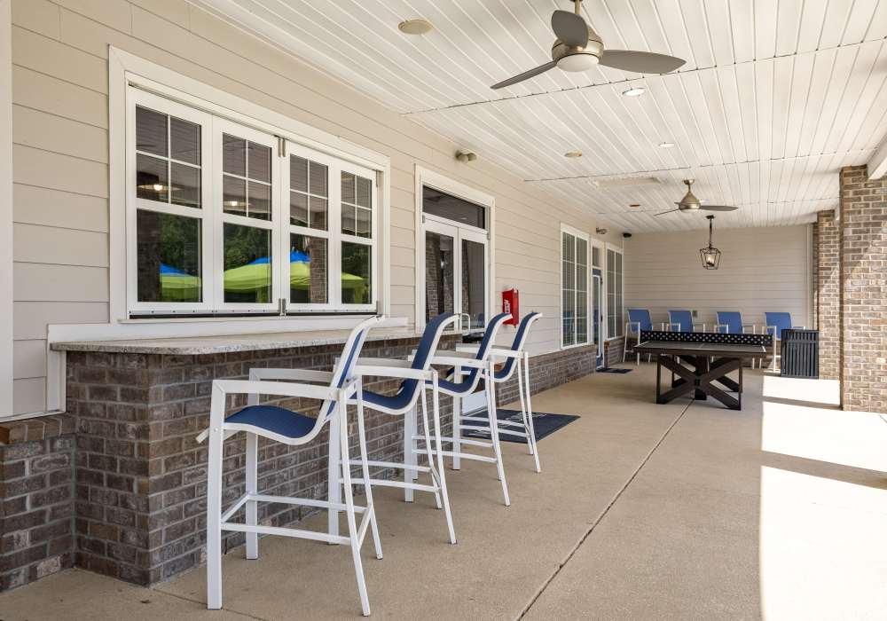 Exterior sitting area and lounge in pool area at Northpoint at 68 in High Point, North Carolina