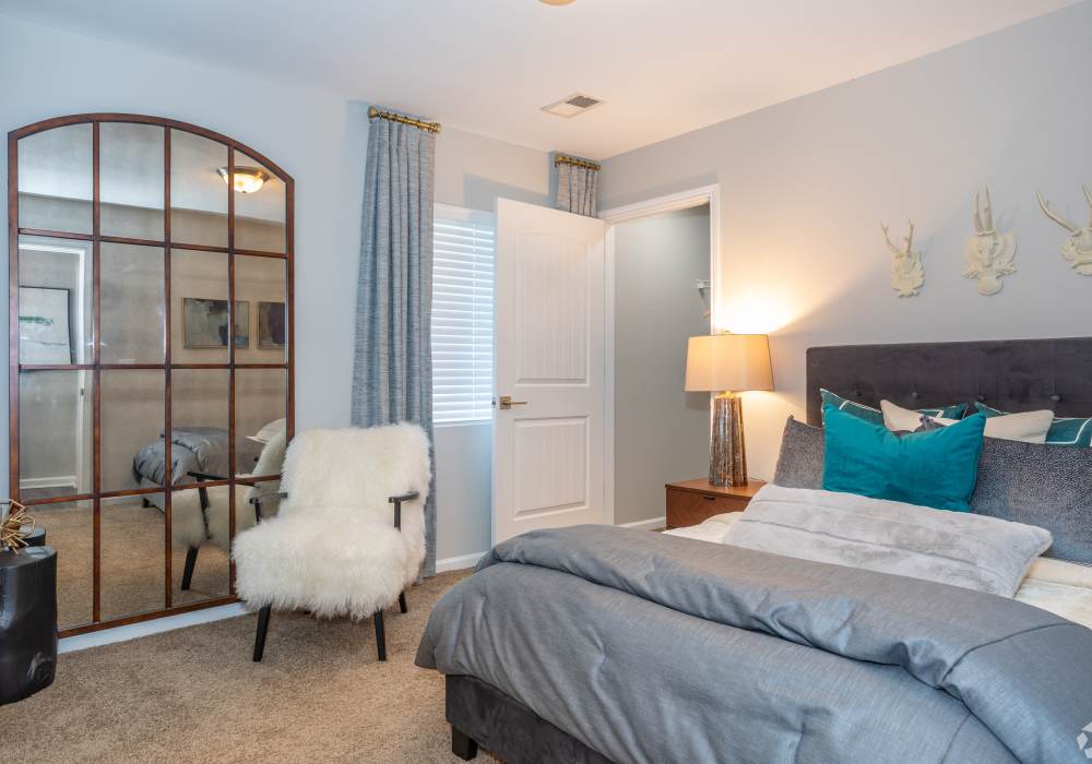 Bright and spacious modern bedrooms with ceiling fan at Featherstone in Durham, North Carolina