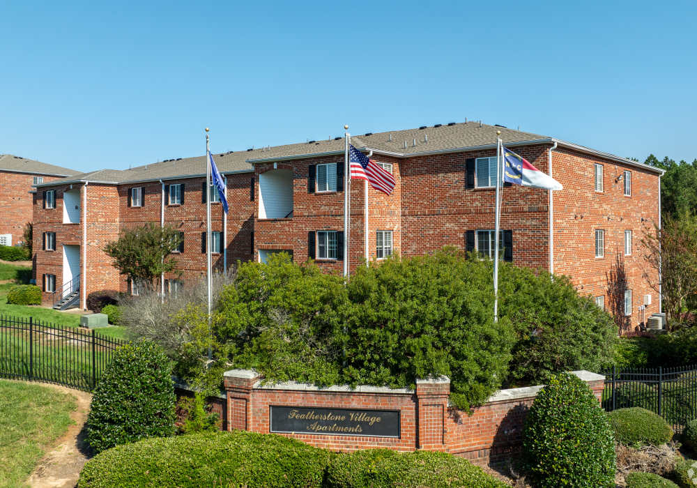 clubhouse lounge with shuffleboard Featherstone in Durham, North Carolina