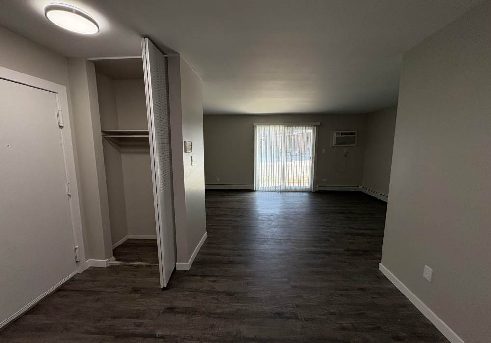 Living room view from hallway at Broadway Crossing Apartments in Merrillville, Indiana