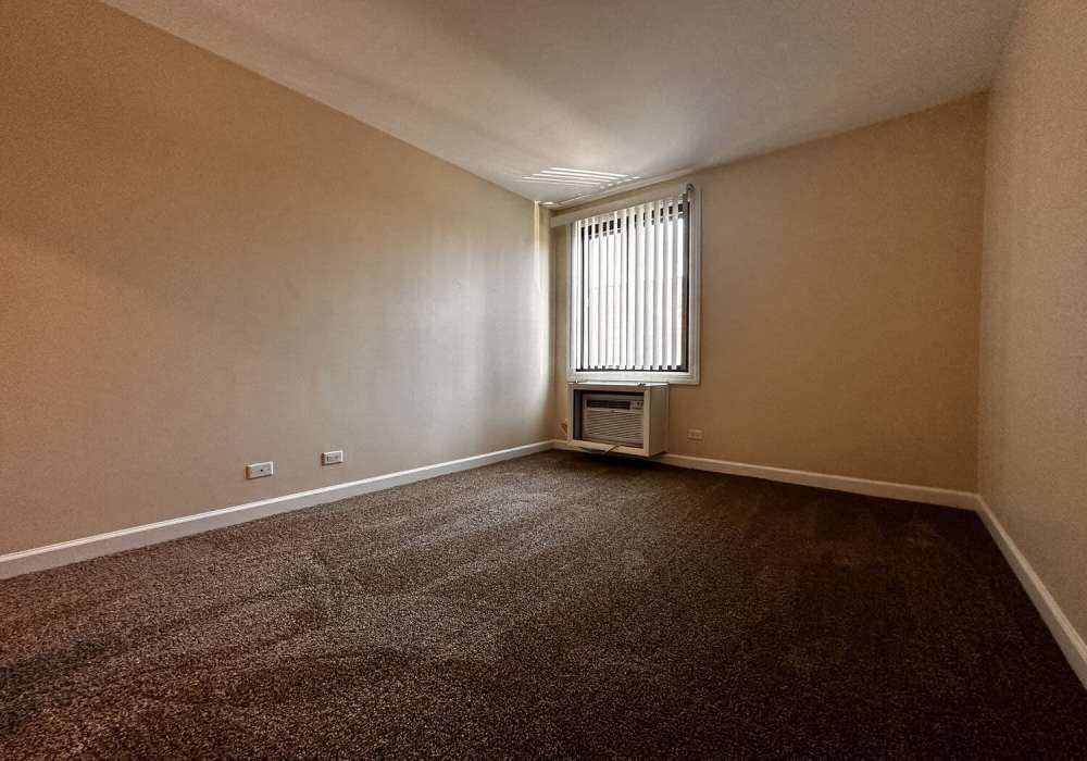 Spacious room at Main Street Apartments in Bensenville, Illinois