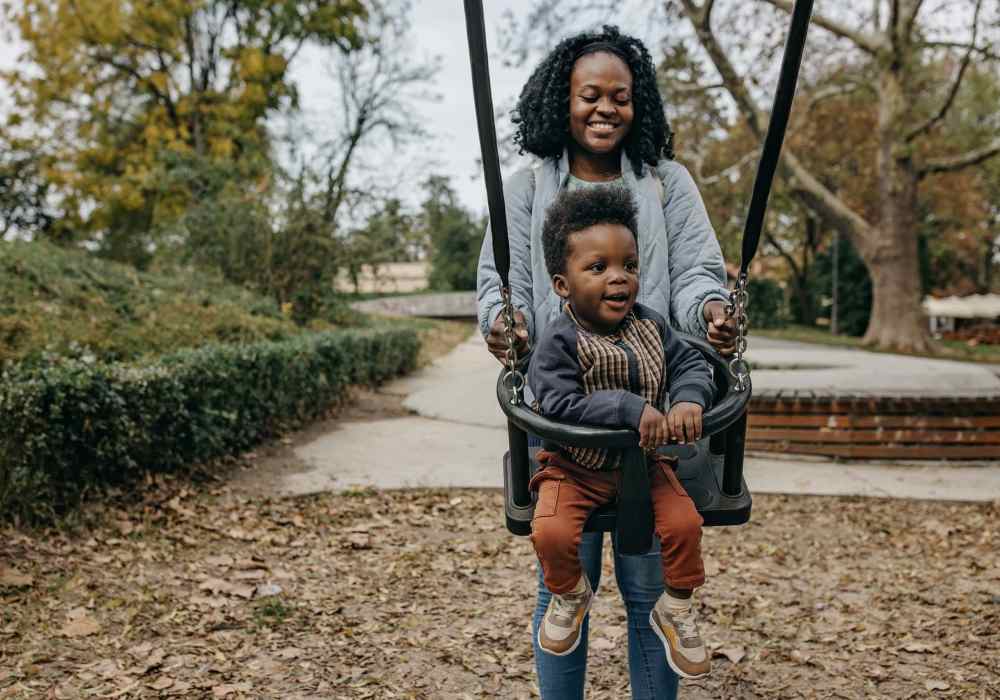 Mother and kid playing at Cresta Bella in San Diego, California