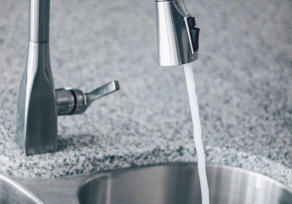 Stainless-steel faucet of a sink at Parkwood Oaks in Bedford, Texas