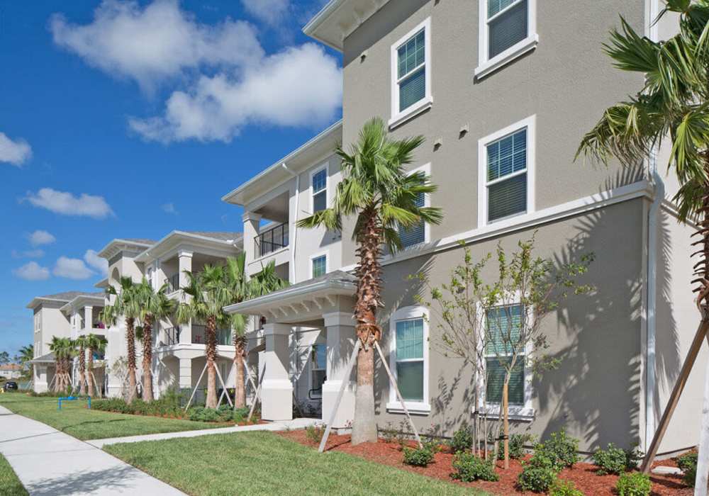 Building exterior with sky view at Messina Luxury Apartments in New Smyrna Beach, Florida