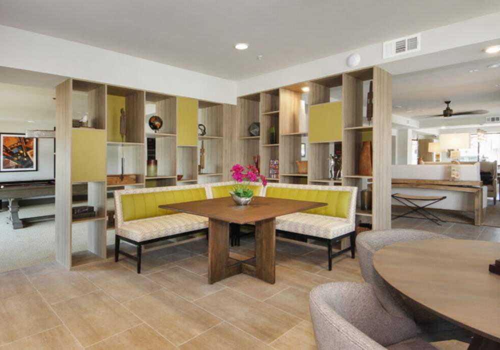 Cozy dining area with bright seating and stylish decor at Messina Luxury Apartments in New Smyrna Beach, Florida