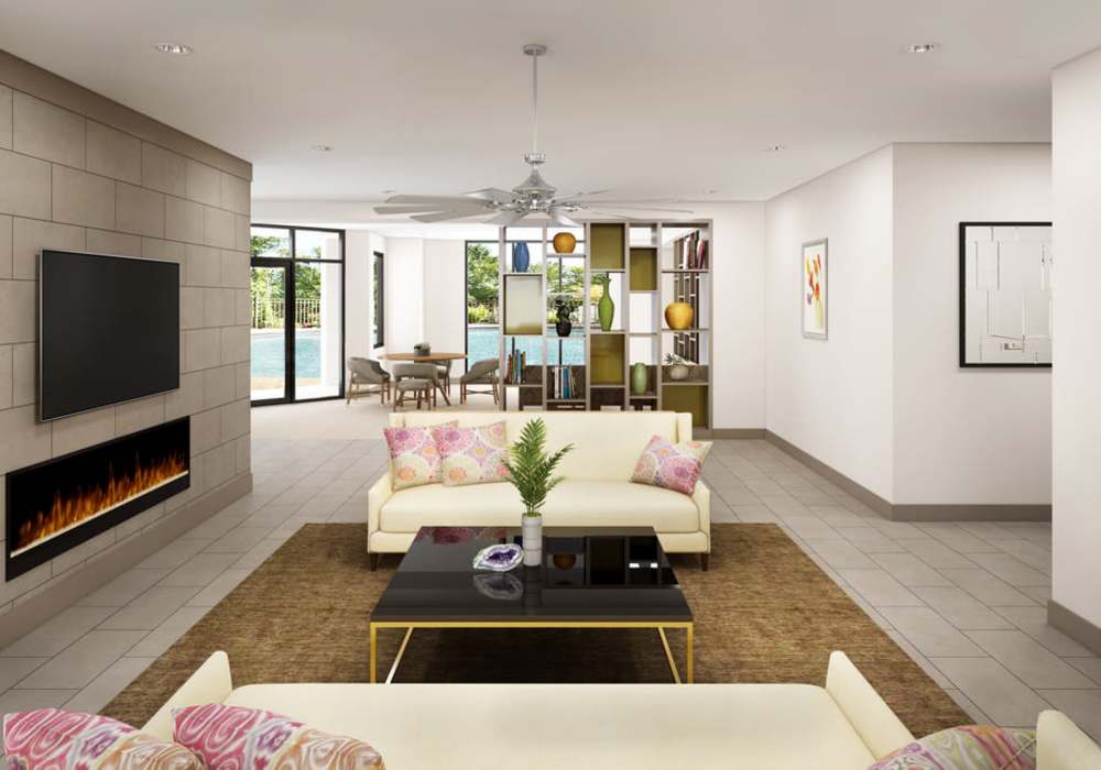 Sunlit living room with modern furnishings and poolside view at Messina Luxury Apartments in New Smyrna Beach, Florida