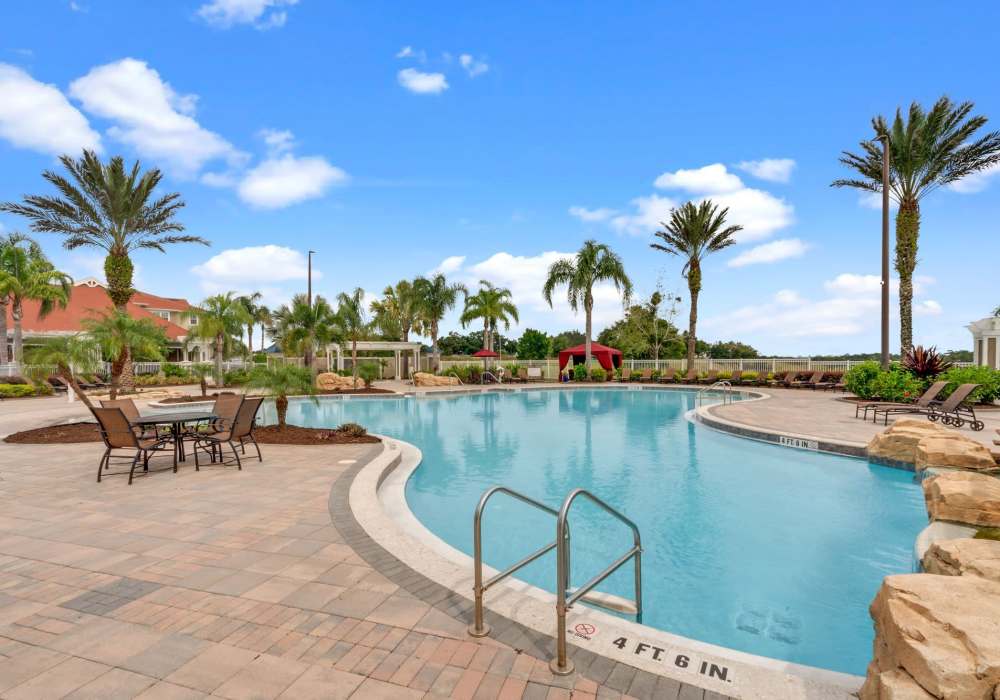 Sparkling pool at Victoria Park Apartments in Davenport,Florida