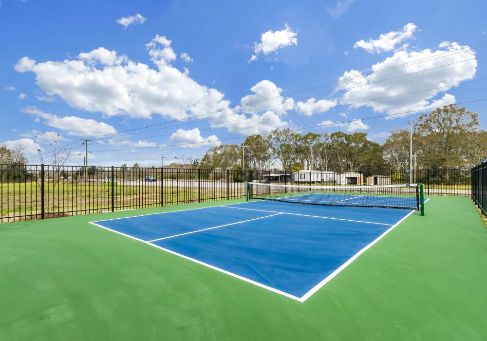 The sparkling resort-style pool at Cottages at Creekview in Lafayette, Louisiana