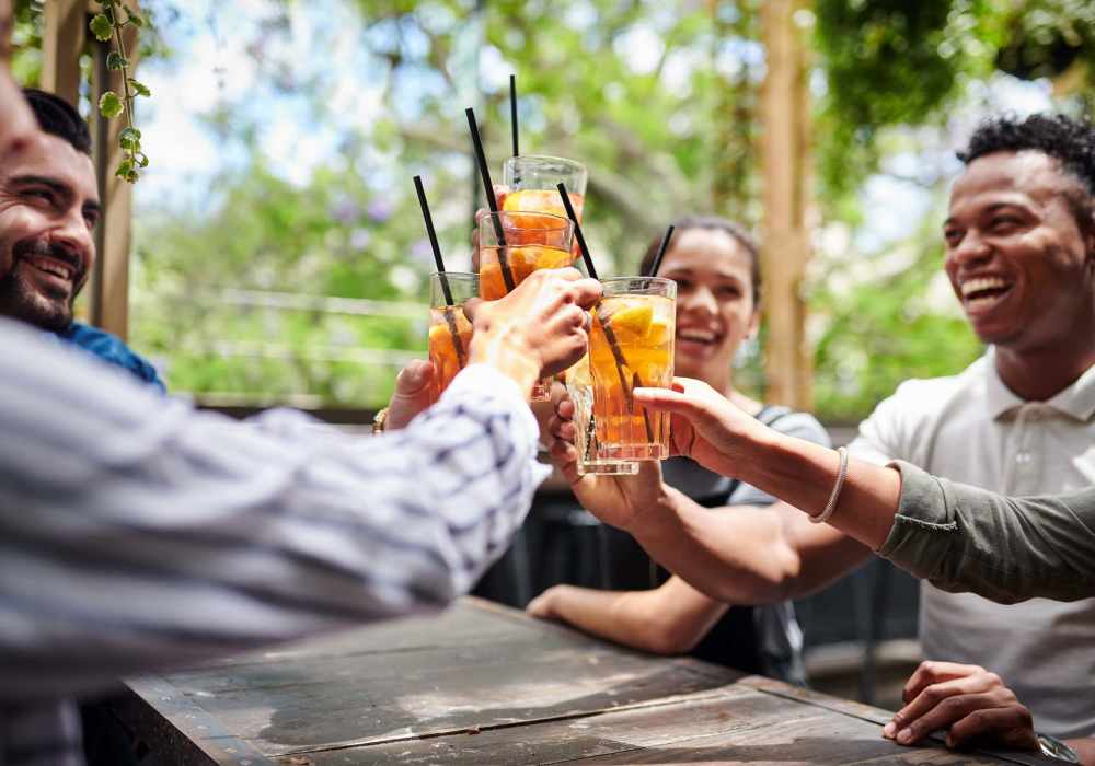 Residents having drinks at a restaurant near Victoria Park Apartments in Davenport,Florida